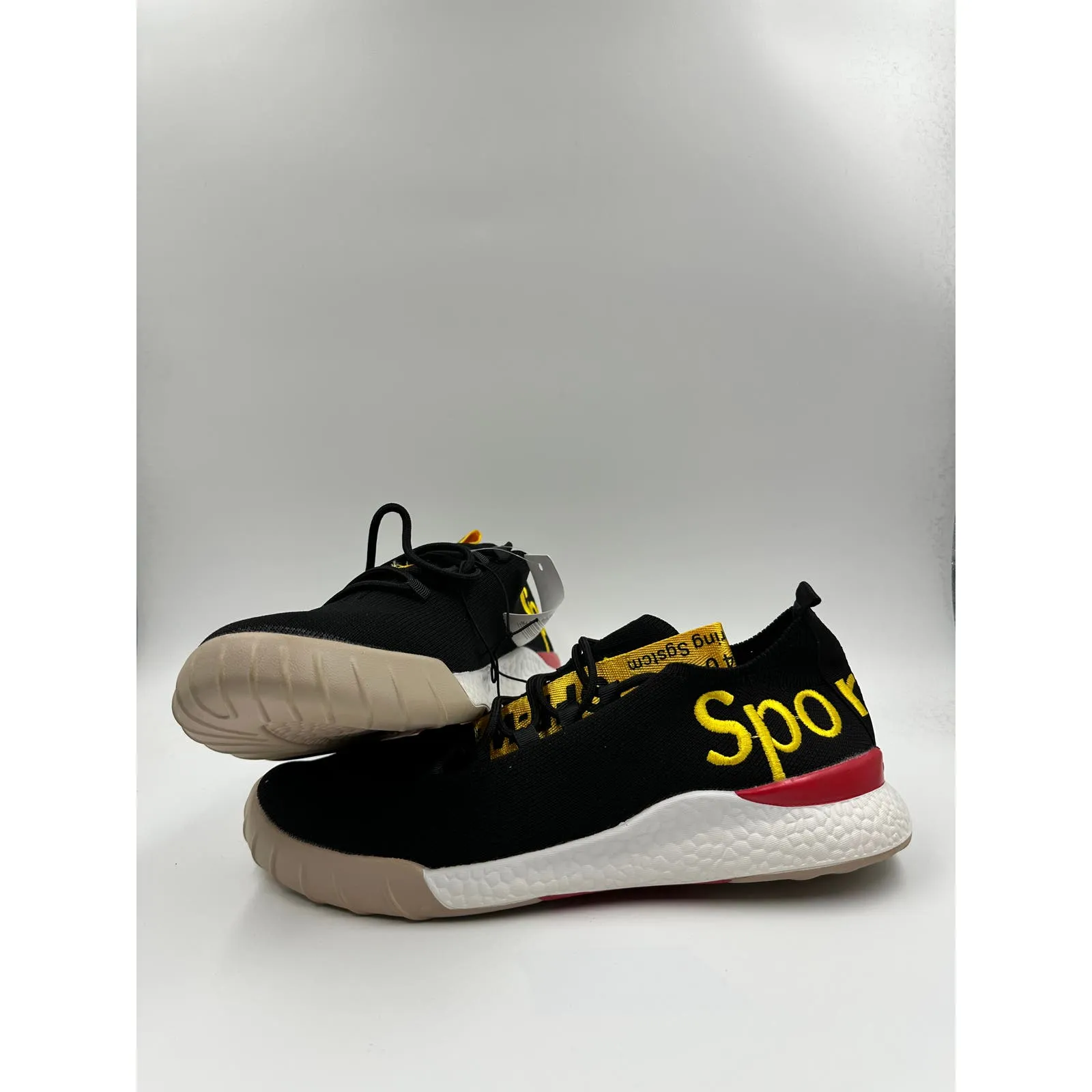 Men's Size 8.5, Black Knit Top Sneakers with Yellow and Red Accents